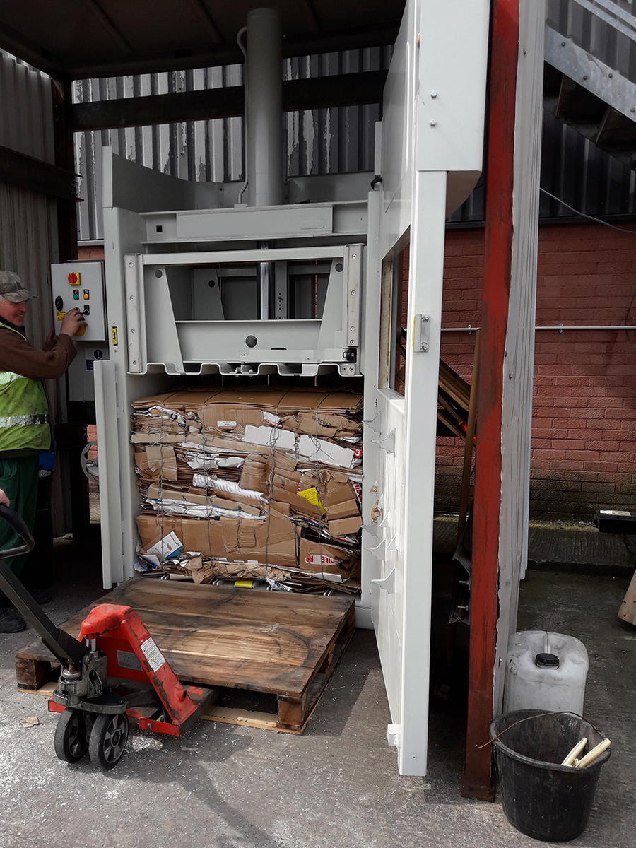 Pallet moved to accept bale from the mill vertical baler